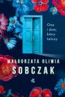 okładka książki - Ona i dom który tańczy